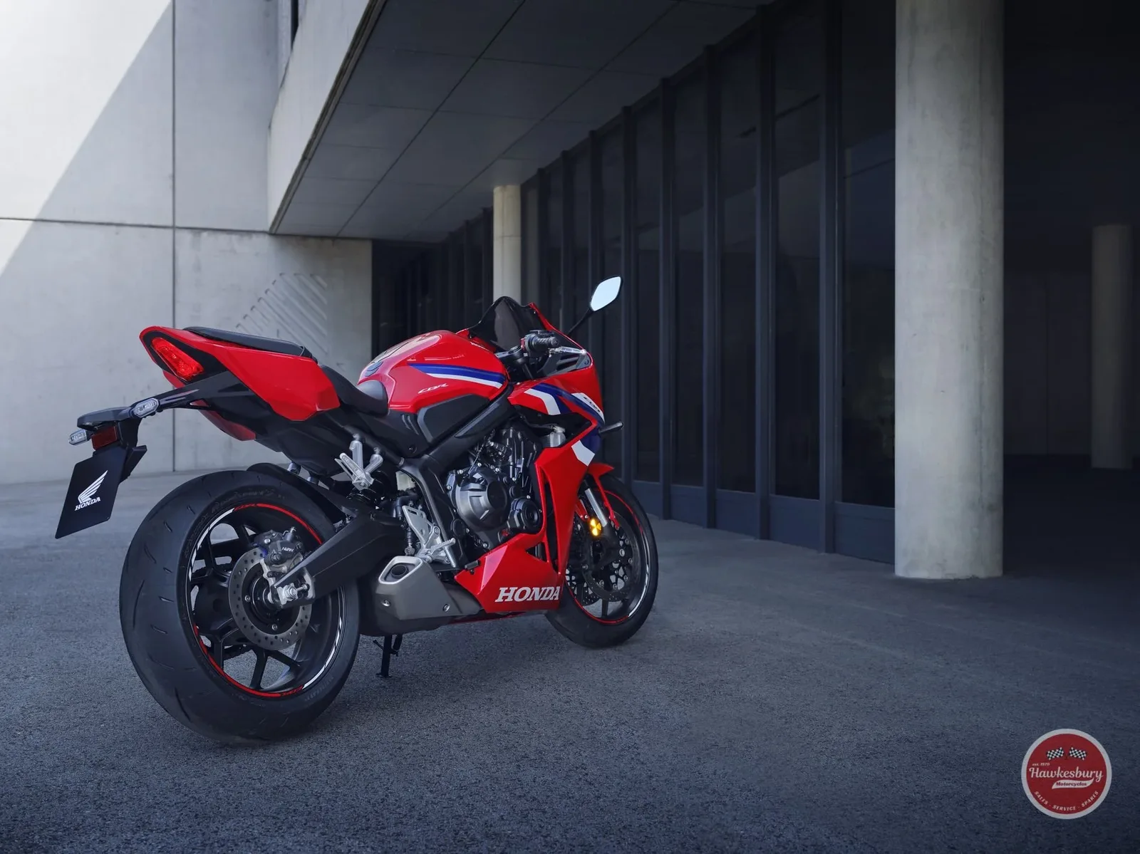 Honda CBR650R in Grand Prix Red, now covered by a 6-year manufacturer-backed warranty