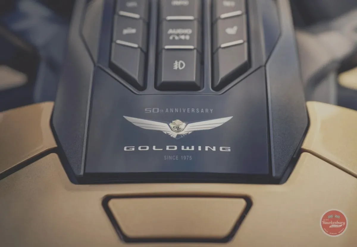 Honda Gold Wing dashboard showing the 50th anniversary winged emblem and Gold Wing lettering