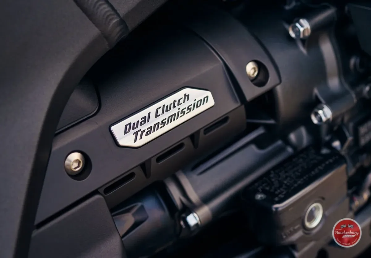 Close-up of a Honda Gold Wing dashboard badge reading Dual Clutch Transmission