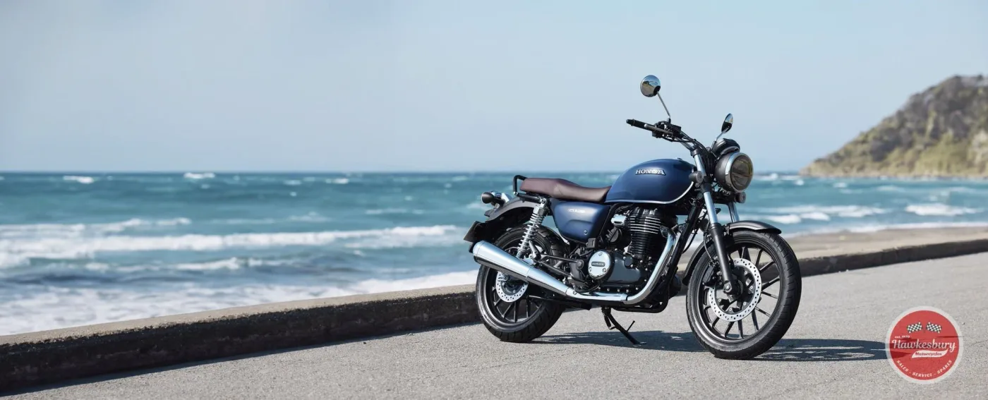 Honda GB350 retro roadster with rounded fuel tank and chrome detailing, side profile