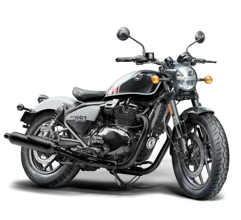 Royal Enfield Shotgun 650 in grey and black with a single seat and blacked-out exhausts, front three-quarter view