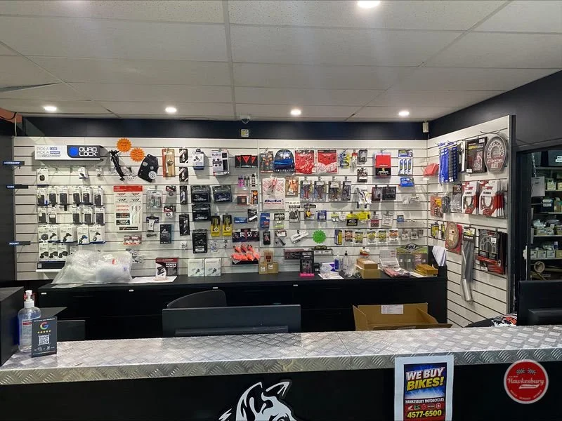 The parts and accessories wall behind the service counter at Hawkesbury Motorcycles