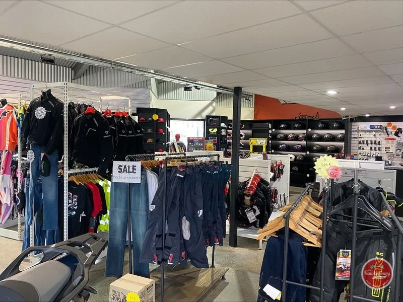 Riding jackets, pants and helmets on the apparel floor
