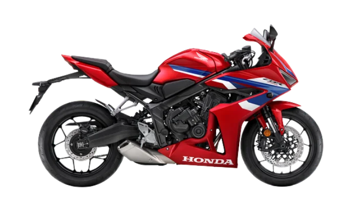 Honda CBR650R middleweight supersport motorcycle in red, white and blue, studio side profile
