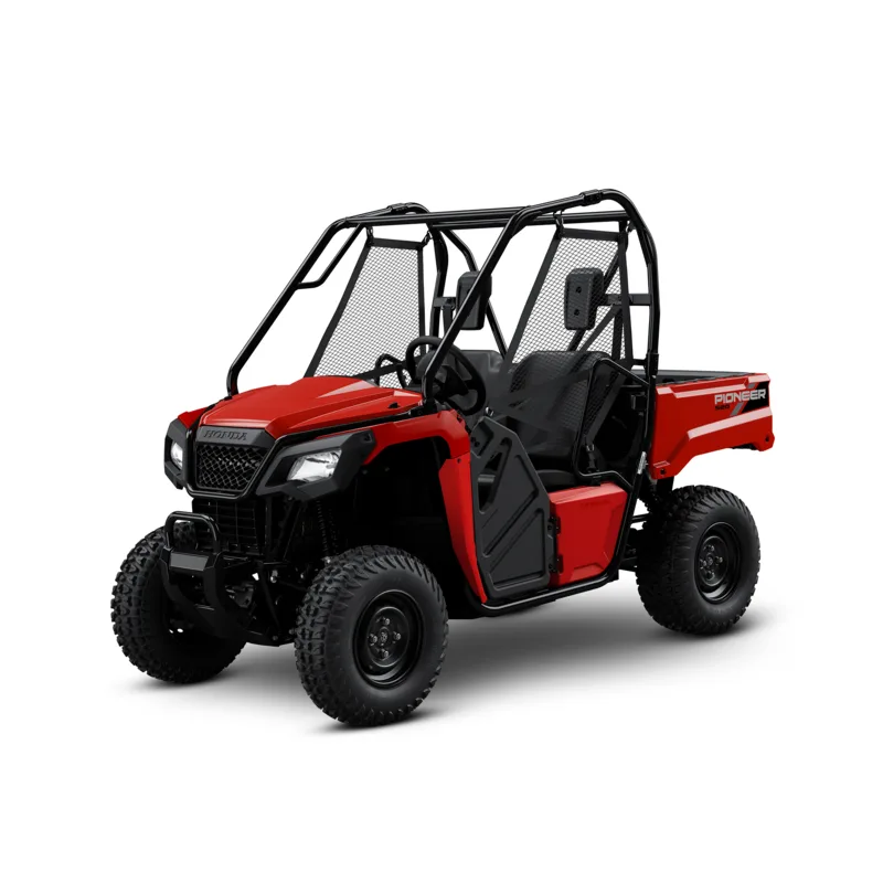 Red Honda Pioneer 520 Side by Side with a black roll cage and flatbed cargo tray, studio three-quarter view on a white background